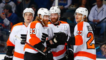 UNIONDALE, NY - MARCH 09: Sean Couturier #14 of the Philadelphia Flyers celebrates his second period goal against the New York Islanders at NYCB Live's Nassau Coliseum on March 9, 2019 in Uniondale, New York. (Photo by Mike Stobe/NHLI via Getty Images)