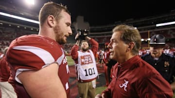 Oct 8, 2016; Fayetteville, AR, USA; Alabama Crimson Tide head coach Nick Saban offers his condolences to Arkansas Razorbacks center Frank Ragnow (72) for the loss Ragnow