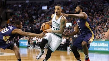 Jan 7, 2017; Boston, MA, USA; Boston Celtics forward Gerald Green (30) drives the ball between New Orleans Pelicans guard Langston Galloway (10) and guard Tyreke Evans (1) during the second half of the Boston Celtics 117-108 win over the New Orleans Pelicans at TD Garden. Mandatory Credit: Winslow Townson-USA TODAY Sports