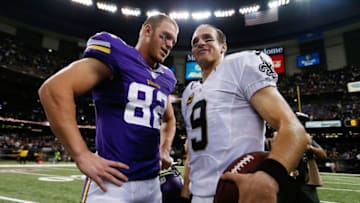 NEW ORLEANS, LA - SEPTEMBER 21: Drew Brees #9 of the New Orleans Saints speaks with Kyle Rudolph #82 of the Minnesota Vikings following a game at the Mercedes-Benz Superdome on September 21, 2014 in New Orleans, Louisiana. (Photo by Sean Gardner/Getty Images)