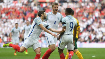 LONDON, ENGLAND - MARCH 26: Jermaine Defoe of England celebrates with Adam Lallana and Eric Dier after scoring his sides first goal during the FIFA 2018 World Cup Qualifier between England and Lithuania at Wembley Stadium on March 26, 2017 in London, England. (Photo by Mike Hewitt/Getty Images)