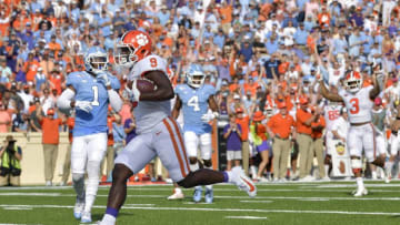 CHAPEL HILL, NORTH CAROLINA - SEPTEMBER 28: Travis Etienne #9 of the Clemson Tigers scores a touchdown during the second quarter of their game against the North Carolina Tar Heels at Kenan Stadium on September 28, 2019 in Chapel Hill, North Carolina. (Photo by Grant Halverson/Getty Images)