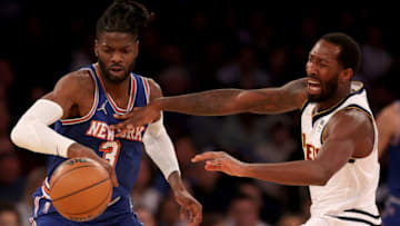 Nerlens Noel of the New York Knicks gets the steal from Davon Reed of the Denver Nuggets at Madison Square Garden on 4 Dec. 2021 in New York City. The Denver Nuggets defeated the New York Knicks 113-99. (Photo by Elsa/Getty Images)
