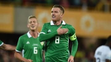 BELFAST, NORTHERN IRELAND - SEPTEMBER 11: Steve Davis of Northern Ireland celebrates with team mates after scoring during the international friendly football match between Northern Ireland and Israel at Windsor Park on September 11, 2018 in Belfast, Northern Ireland. (Photo by Charles McQuillan/Getty Images)