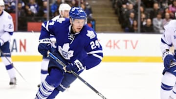 Mar 15, 2016; Toronto, Ontario, CAN; Toronto Maple Leafs center Peter Holland (24) pursues the play against Tampa Bay Lightning in the first period at Air Canada Centre. Mandatory Credit: Dan Hamilton-USA TODAY Sports