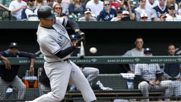 BALTIMORE, MD - APRIL 7: New York Yankees catcher Gary Sanchez (24) hits a home run during the game between the New York Yankees and the Baltimore Orioles on April 7, 2019, at Orioles Park at Camden Yards in Baltimore, MD. (Photo by Mark Goldman/Icon Sportswire via Getty Images)
