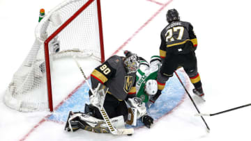 Robin Lehner #90 of the Vegas Golden Knights covers up the puck against Corey Perry #10 of the Dallas Stars during the third period in Game Five of the Western Conference Final. (Photo by Bruce Bennett/Getty Images)