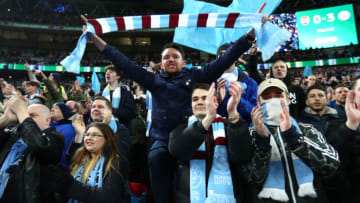 LONDON, ENGLAND - FEBRUARY 25: Manchester City fans celebrate afrer the Carabao Cup Final between Arsenal and Manchester City at Wembley Stadium on February 25, 2018 in London, England. (Photo by Julian Finney/Getty Images)