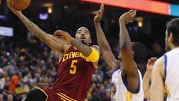 Jan 9, 2015; Oakland, CA, USA; Cleveland Cavaliers guard J.R. Smith (5) prepares to attempt a shot against the Golden State Warriors in the second quarter at Oracle Arena. Mandatory Credit: Cary Edmondson-USA TODAY Sports