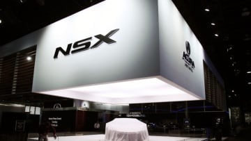 DETROIT, MI, - JANUARY 15:The new Acura NSX concept vehicle awaits its reveal at the 2013 North American International Auto Show media preview January 15, 2013 in Detroit, Michigan. Approximately 6000 members of the media from 68 countries are attending the show this year. The 2013 NAIAS opens to the public January 19th. (Photo by Bill Pugliano/Getty Images)