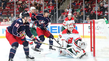 NEWARK, NJ - DECEMBER 23: Keith Kinkaid #1 of the New Jersey Devils makes a save against Pierre-Luc Dubois of the Columbus Blue Jackets at Prudential Center on December 23, 2018 in Newark, New Jersey. The Columbus Blue Jackets won 3-0. (Photo by Jared Silber/NHLI via Getty Images)
