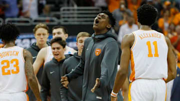 LOUISVILLE, KENTUCKY - MARCH 28: Kyle Alexander #11 of the Tennessee Volunteers celebrates with teammates against the Purdue Boilermakers during the second half of the 2019 NCAA Men's Basketball Tournament South Regional at the KFC YUM! Center on March 28, 2019 in Louisville, Kentucky. (Photo by Kevin C. Cox/Getty Images)