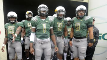 EUGENE, OR - SEPTEMBER 19: Jamere Holland #19, Darron Thomas #1, Eddie Pleasant #11 and Jeremiah Masoli #8 of the Oregon Ducks wait in the tunnel to be introduced before the start of the game against the Utah Utes at Autzen Stadium on September 19, 2009 in Eugene, Oregon. Oregon won the game 31-24. (Photo by Steve Dykes/Getty Images)