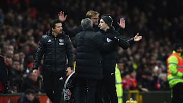 MANCHESTER, ENGLAND - JANUARY 15: Jose Mourinho manager of Manchester United and Jurgen Klopp manager of Liverpool argue on the touchline as fourth official Craig Pawson intervenes during the Premier League match between Manchester United and Liverpool at Old Trafford on January 15, 2017 in Manchester, England. (Photo by Laurence Griffiths/Getty Images)