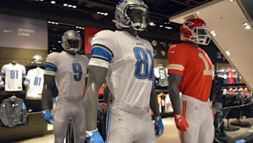 Oct 28, 2015; London, United Kingdom; General view of mannequins with the uniforms and helmets of Detroit Lions receiver Calvin Johnson (81) and quarterback Matthew Stafford (9) and Kansas City Chiefs quarterback Alex Smith (11) at Niketown London in advance of the NFL International Series game. Mandatory Credit: Kirby Lee-USA TODAY Sports