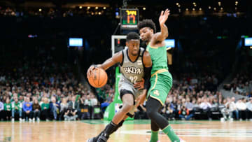 BOSTON, MA - MARCH 3: Caris LeVert #22 of the Brooklyn Nets drives past Marcus Smart #36 of the Boston Celtics in the first half at TD Garden on March 3, 2020 in Boston, Massachusetts. NOTE TO USER: User expressly acknowledges and agrees that, by downloading and or using this photograph, User is consenting to the terms and conditions of the Getty Images License Agreement. (Photo by Kathryn Riley/Getty Images)