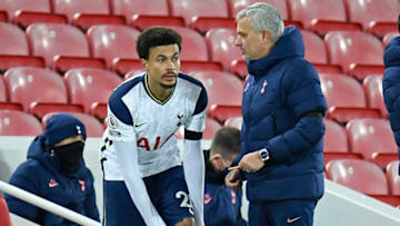 Tottenham Hotspur's Portuguese head coach Jose Mourinho (R) talks with Tottenham Hotspur's English midfielder Dele Alli as he is abot to be substituted on during the English Premier League football match between Liverpool and Tottenham Hotspur at Anfield in Liverpool, north west England on December 16, 2020. (Photo by PETER POWELL / POOL / AFP) / RESTRICTED TO EDITORIAL USE. No use with unauthorized audio, video, data, fixture lists, club/league logos or 'live' services. Online in-match use limited to 120 images. An additional 40 images may be used in extra time. No video emulation. Social media in-match use limited to 120 images. An additional 40 images may be used in extra time. No use in betting publications, games or single club/league/player publications. / (Photo by PETER POWELL/POOL/AFP via Getty Images)