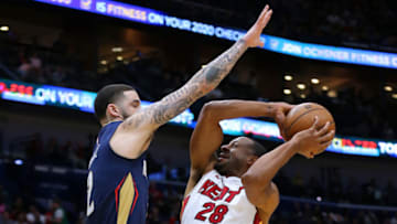 Andre Iguodala #28 of the Miami Heat shoots against Lonzo Ball #2 of the New Orleans Pelicans (Photo by Jonathan Bachman/Getty Images)