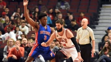 Oct 14, 2015; Chicago, IL, USA; Chicago Bulls forward Nikola Mirotic (44) is guarded by Detroit Pistons forward Stanley Johnson (3) during the first quarter at the United Center. Mandatory Credit: David Banks-USA TODAY Sports