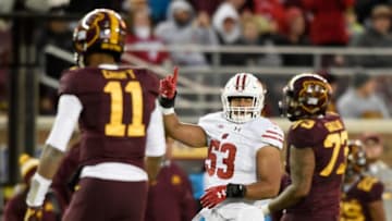 MINNEAPOLIS, MN - NOVEMBER 25: T.J. Edwards #53 of the Wisconsin Badgers celebrates a tackle on third down as quarterback Demry Croft #11 and Donnell Greene #73 of the Minnesota Golden Gophers head back to the bench during the third quarter of the game on November 25, 2017 at TCF Bank Stadium in Minneapolis, Minnesota. The Badgers defeated the Golden Gophers 31-0. (Photo by Hannah Foslien/Getty Images)