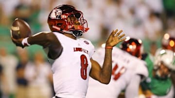 Sep 24, 2016; Huntington, WV, USA; Louisville Cardinals quarterback Lamar Jackson (8) throws a pass for a touchdown to wide receiver James Quick (not pictured) against the Marshall Thundering Herd in the first half at Joan C. Edwards Stadium. Mandatory Credit: Aaron Doster-USA TODAY Sports