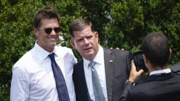 WASHINGTON, DC - JULY 20: (L-R) Quarterback Tom Brady takes a photo with Labor Secretary Marty Walsh as U.S. President Joe Biden welcomes the 2021 NFL Super Bowl champion Tampa Bay Buccaneers to the South Lawn of the White House on July 20, 2021 in Washington, DC. (Photo by Drew Angerer/Getty Images)