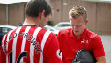 SOUTHAMPTON, ENGLAND - AUGUST 12: James Ward-Prowse of Southampton signs autographs prior to the Premier League match between Southampton and Swansea City at St Mary's Stadium on August 12, 2017 in Southampton, England. (Photo by Charlie Crowhurst/Getty Images)