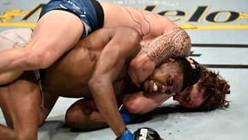 BOSTON, MASSACHUSETTS - OCTOBER 18: Brendan Allen secures a rear choke submission against Kevin Holland in their middleweight bout during the UFC Fight Night event at TD Garden on October 18, 2019 in Boston, Massachusetts. (Photo by Chris Unger/Zuffa LLC via Getty Images)