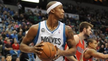 Feb 8, 2014; Minneapolis, MN, USA; Minnesota Timberwolves forward Dante Cunningham (33) brings down a rebound in the first quarter at Target Center. Mandatory Credit: Marilyn Indahl-USA TODAY Sports