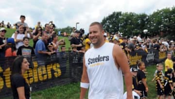 Jul 29, 2013; Latrobe, PA, USA; Pittsburgh Steelers quarterback Ben Roethlisberger (7) greets the crowd at St. Vincent College prior to practice. Mandatory Credit: Vincent Pugliese-USA TODAY Sports
