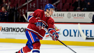 MONTREAL, QC - OCTOBER 20: Mikhail Sergachev #22 of the Montreal Canadiens takes a shot during the warmup prior to the NHL game against the Arizona Coyotes at the Bell Centre on October 20, 2016 in Montreal, Quebec, Canada. The Montreal Canadiens defeated the Arizona Coyotes 5-2. (Photo by Minas Panagiotakis/Getty Images)