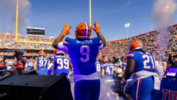 GAINESVILLE, FLORIDA - NOVEMBER 27: Gervon Dexter #9 of the Florida Gators takes the field before the start of a game against the Florida State Seminoles at Ben Hill Griffin Stadium on November 27, 2021 in Gainesville, Florida. (Photo by James Gilbert/Getty Images)