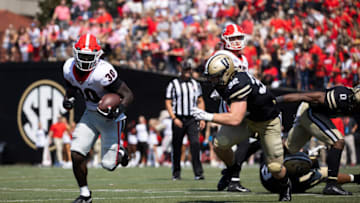 NASHVILLE, TN - SEPTEMBER 25: Daijun Edwards #30 of the Georgia Bulldogs runs the ball for a touchdown against the Vanderbilt Commodores during the fourth quarter at Vanderbilt Stadium on September 25, 2021 in Nashville, Tennessee. Georgia defeats Vanderbilt 62-0. (Photo by Brett Carlsen/Getty Images)