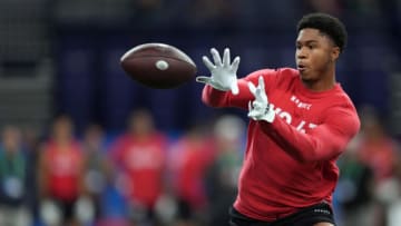 Cincinnati Bearcats wide receiver Tyler Scott participates in drills at Lucas Oil Stadium. USA Today.