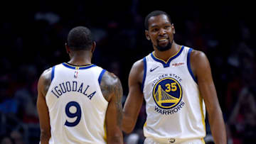 LOS ANGELES, CALIFORNIA - APRIL 26: Kevin Durant #35 of the Golden State Warriors celebrates with Andre Iguodala #9 as he leaves the game late in the fourth quarter in a 129-110 win over the LA Clippers during Game Six of Round One of the 2019 NBA Playoffs at Staples Center on April 26, 2019 in Los Angeles, California. (Photo by Harry How/Getty Images) NOTE TO USER: User expressly acknowledges and agrees that, by downloading and or using this photograph, User is consenting to the terms and conditions of the Getty Images License Agreement.