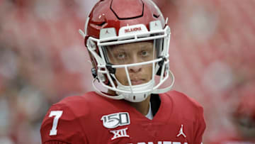 NORMAN, OK - SEPTEMBER 28: Quarterback Spencer Rattler #7 of the Oklahoma Sooners warms up before the game against the Texas Tech Red Raiders at Gaylord Family Oklahoma Memorial Stadium on September 28, 2019 in Norman, Oklahoma. The Sooners defeated the Red Raiders 55-16. (Photo by Brett Deering/Getty Images)