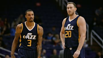 Oct 5, 2016; Phoenix, AZ, USA; Utah Jazz guard George Hill (3) and forward Gordon Hayward (20) talk mid court during the first half of the game against the Phoenix Suns at Talking Stick Resort Arena. The Utah Jazz defeated the Phoenix Suns 104-99. Mandatory Credit: Jennifer Stewart-USA TODAY Sports