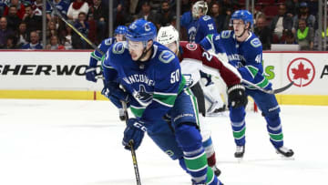 VANCOUVER, BC - NOVEMBER 2: Brendan Gaunce #50 of the Vancouver Canucks skates up ice with the puck during their NHL game against the Colorado Avalanche at Rogers Arena November 2, 2018 in Vancouver, British Columbia, Canada. (Photo by Jeff Vinnick/NHLI via Getty Images)"n