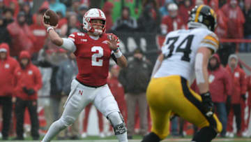 LINCOLN, NE - NOVEMBER 29: Quarterback Adrian Martinez #2 of the Nebraska Cornhuskers passes against linebacker Kristian Welch #34 of the Iowa Hawkeyes at Memorial Stadium on November 29, 2019 in Lincoln, Nebraska. (Photo by Steven Branscombe/Getty Images)