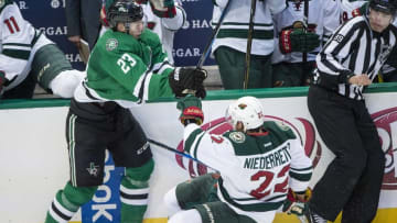Nov 21, 2016; Dallas, TX, USA; Dallas Stars defenseman Esa Lindell (23) checks Minnesota Wild right wing Nino Niederreiter (22) during the second period at the American Airlines Center. Mandatory Credit: Jerome Miron-USA TODAY Sports