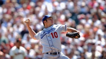 SAN FRANCISCO, CA - SEPTEMBER 11: Hideo Nomo #10 of the Los Angeles Dodgers winds back to pitch during the game against the San Francisco Giants at Pacific Bell Park on September 11, 2002 in San Francisco, California. The Dogers would win 7-2. (Photo by Harry How/Getty Images)