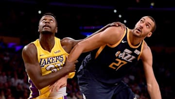 LOS ANGELES, CA - OCTOBER 10: Julius Randle #30 of the Los Angeles Lakers fouls Rudy Gobert #27 of the Utah Jazz during the fourth quarter in a 105-99 Jazz win at Staples Center on October 10, 2017 in Los Angeles, California. (Photo by Harry How/Getty Images)