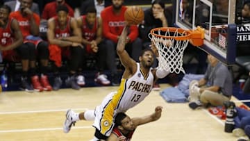 Apr 29, 2016; Indianapolis, IN, USA; Indiana Pacers forward Paul George (13) shoots the ball over Toronto Raptors guard Cory Joseph (6) during the second half in game six of the first round of the 2016 NBA Playoffs at Bankers Life Fieldhouse. The Pacers won 101-83. Mandatory Credit: Brian Spurlock-USA TODAY Sports