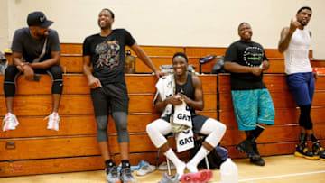 MIAMI, FL - AUGUST 09: Dwyane Wade of the Miami Heat, Victor Oladipo of the Indiana Pacers and NBA skills trainer Stanley Remy react during NBA Off-season training with Remy Workouts on August 9, 2018 in Miami, Florida. (Photo by Michael Reaves/Getty Images)