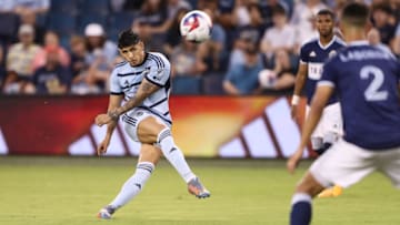Jul 1, 2023; Kansas City, Kansas, USA; Sporting Kansas City forward Alan Pulido (9) takes a shot at goal during the game against the Vancouver Whitecaps at Children's Mercy Park. Mandatory Credit: William Purnell-USA TODAY Sports