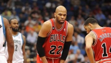 Apr 9, 2014; Minneapolis, MN, USA; Chicago Bulls forward Taj Gibson (22) reacts to a call in the second half against the Minnesota Timberwolves at Target Center. The Bulls defeated the Wolves 102-87. Mandatory Credit: Marilyn Indahl-USA TODAY Sports
