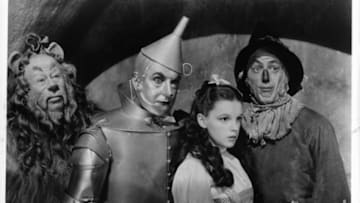 Bert Lahr as the Cowardly Lion, Jack Haley as the Tin Man, Judy Garland as Dorothy Gale and Ray Bolger as the Scarecrow in a scene from the film 'The Wizard Of Oz', 1939. (Photo by Metro-Goldwyn-Mayer/Getty Images)