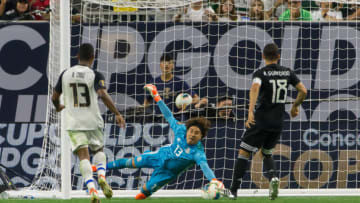 HOUSTON, TX - JUNE 29: Guillermo Ochoa (13) of Mexico makes a save with his left hand during the Quarterfinals match between Mexico and Costa Rica as part of the 2019 CONCACAF Gold Cup on June 29, 2019, at NRG Stadium in Houston, Texas. (Photo by David Buono/Icon Sportswire via Getty Images)