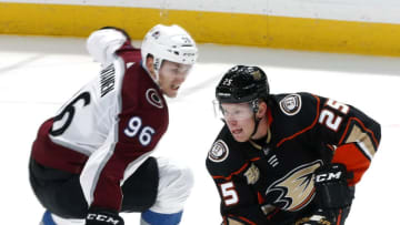 ANAHEIM, CA - NOVEMBER 18: Ondrej Kase #25 of the Anaheim Ducks skates with the puck with pressure from Mikko Rantanen #96 of the Colorado Avalanche during the game on November 18, 2018 at Honda Center in Anaheim, California. (Photo by Debora Robinson/NHLI via Getty Images)