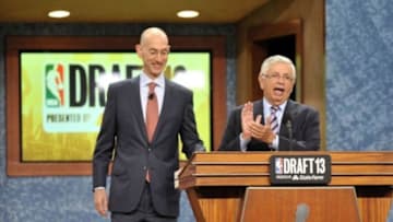 Jun 27, 2013; Brooklyn, NY, USA; NBA commissioner David Stern (right) introduces deputy commissioner Adam Silver after the first round of the 2013 NBA Draft at the Barclays Center. Mandatory Credit: Joe Camporeale-USA TODAY Sports